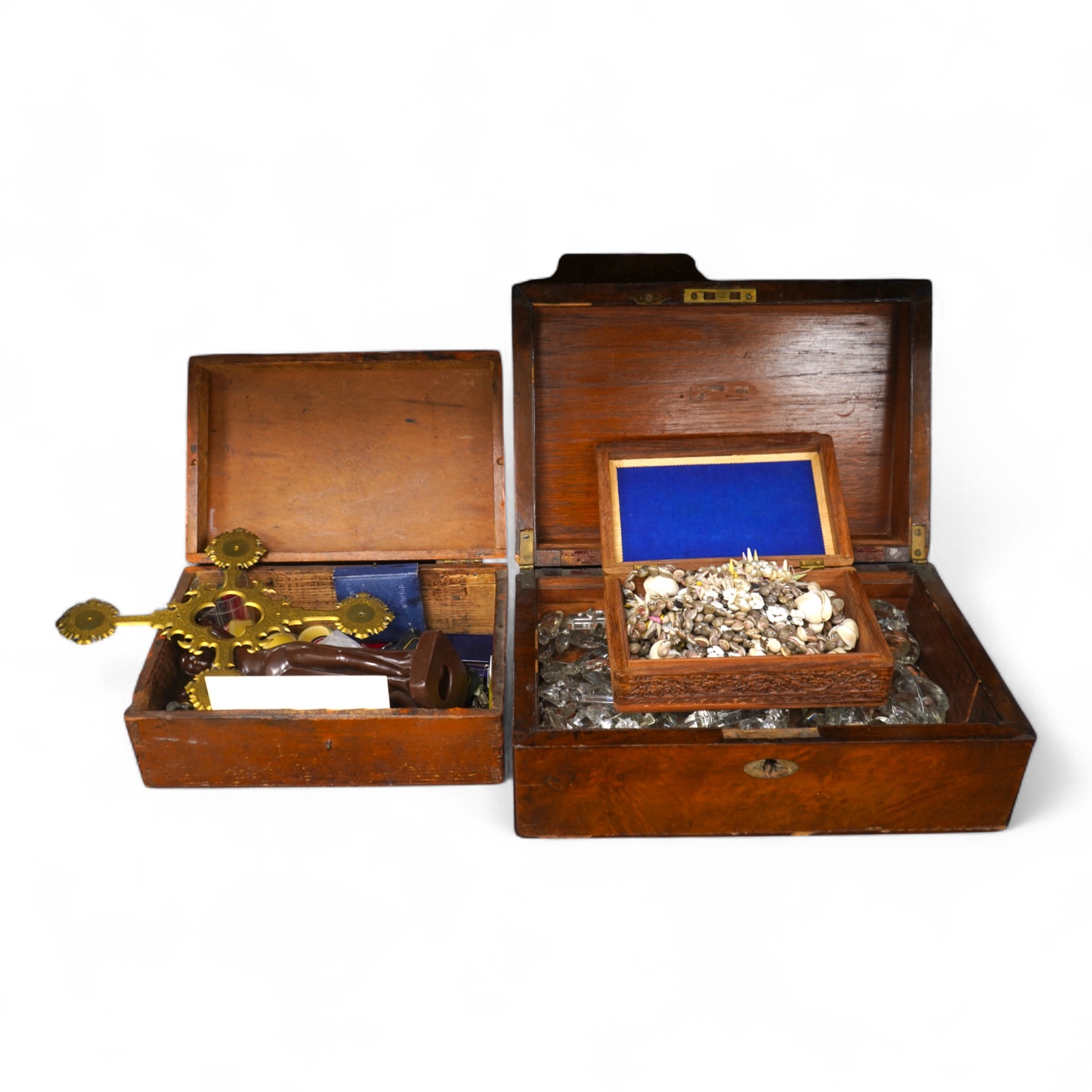 A box of cut glass drops, together with box of gaming counters, a gilt metal cross, an Art Deco ceramic nude figure, two frames, a parker pen, etc.
